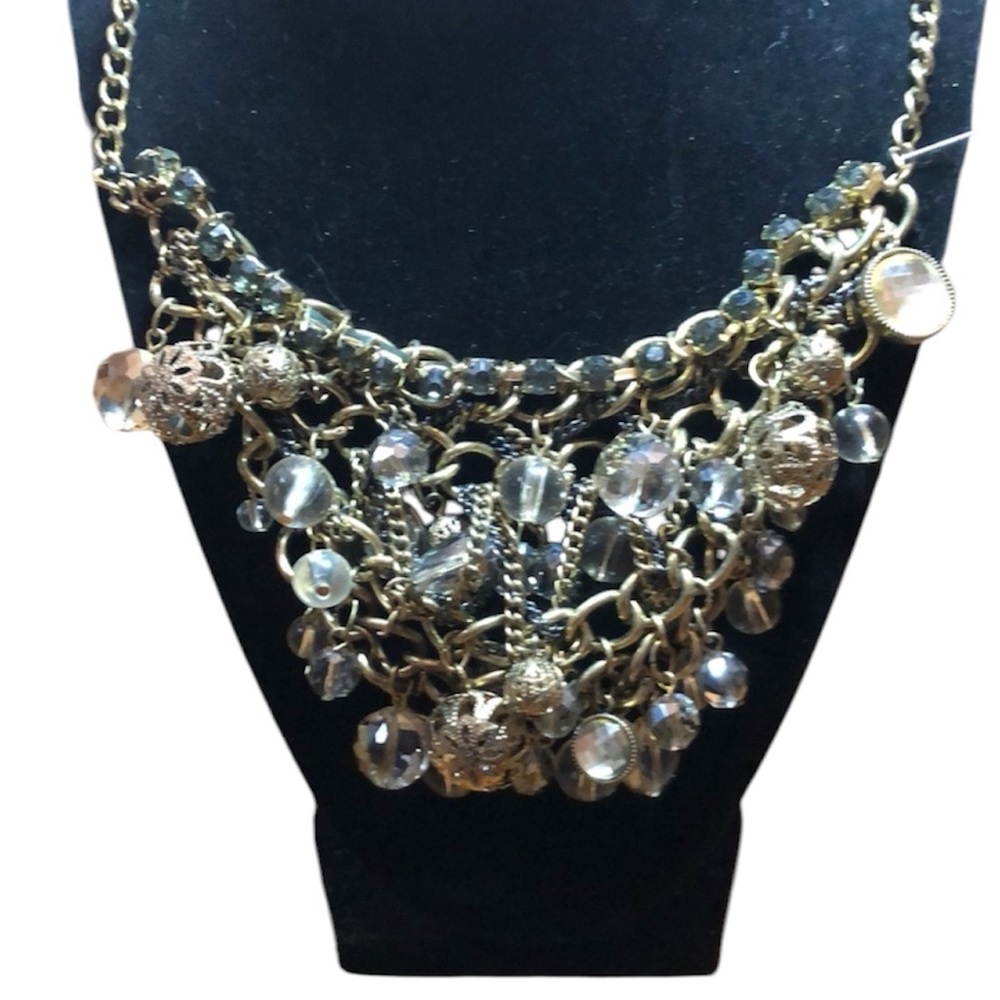 Necklace Bib style chunky gold tone baubles. Truly a statement necklace.